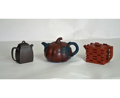 Three Chinese Yixing Clay Teapots  - Circa, mid 20th century - Pot and lid stamped with impressed seal marks - Height: 9.2cm;