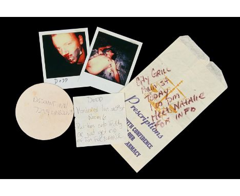 MEMENTO (2000) - Leonard's (Guy Pearce) Mementos Leonard's (Guy Pearce) memory aids from the Christopher Nolan Oscar®-nominat