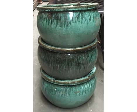 Three blue/green glazed circular ceramic planters, 32cmD 