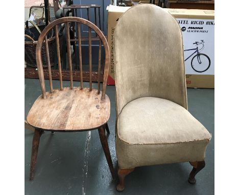 An Ercol style oak stickback chair with bentwood rail; together with an upholstered high back nursing chair 