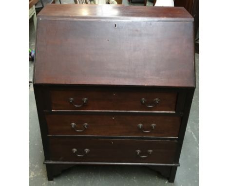 A small mahogany bureau, fall front above three drawers, on bracket feet