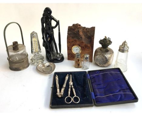 A black ceramic figural desk set, a c.1900 cut glass desk thermometer, burr wood mounted timepiece, a late Victorian desk lam