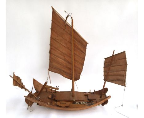 A wooden scale model of a Chinese junk ship 