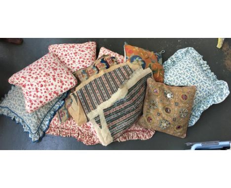 A box of cushions and tapestry covers 