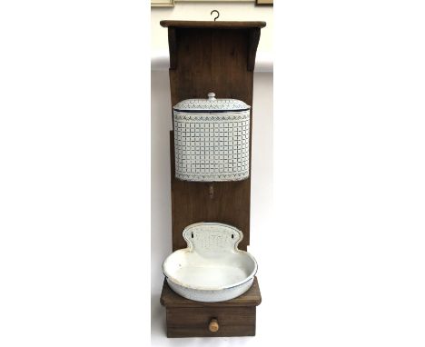 A Continental wash stand, the enamel tank over enamel basin, with drawer below 