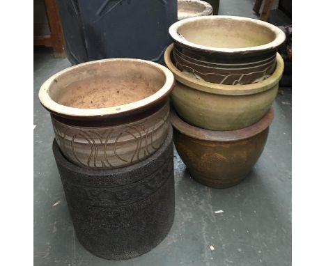 Five large ceramic planters of various sizes 