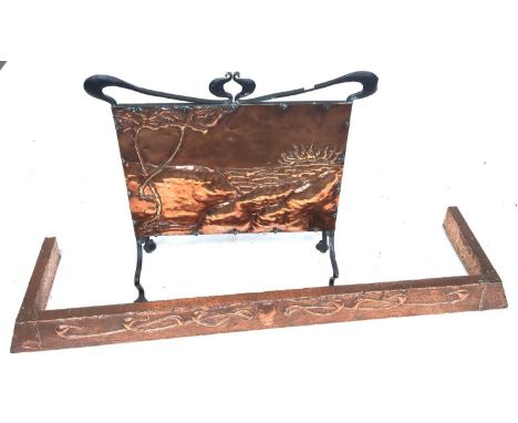 An Art Nouveau copper fire surround, 133cmW, together with a matching copper and wrought iron fire screen 