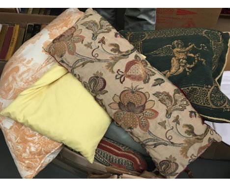 A large quantity of cushions, some tapestry 