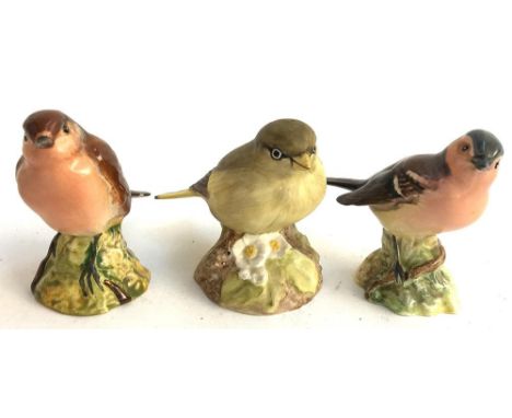 Two Beswick ceramic birds, marked to base, each 7.5cmH; together with an Aynsley ceramic Goldfinch, 7cmH 