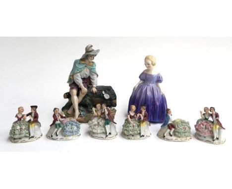 A Royal Doulton 'Marie' figurine, 13cmH, together with continental figurine of a man sitting on a tree trunk (af), marked 'VS