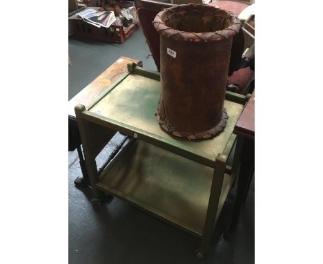 A leather stick stand, together with a green painted hostess trolley with undershelf, 61cmW 