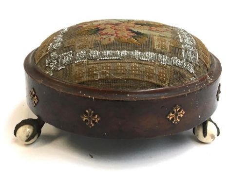 A 19th century mahogany footstool, beadwork and embroidery, applied decoration, on three claw and ceramic ball feet, 28.5cmD 