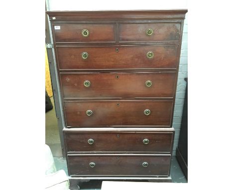 A Regency chest on chest, the top with two short over three graduating drawers, the base with two drawers, on bracket feet, 9