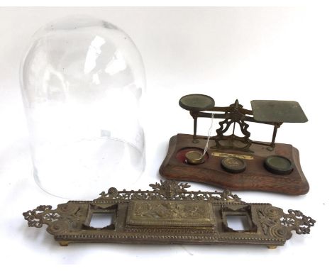 A Regency brass pen stand, together with a set of postal scales with various Avery weights, and a 19th century glass cloche 