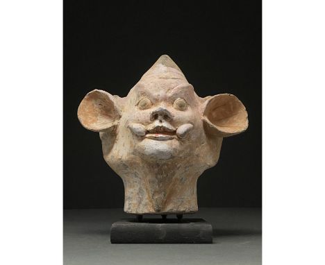 C. AD 618 and 907. Tang Dynasty. A beautiful ceramic head of Lokapala with protruding wing-form ears, elongated lower tusks c