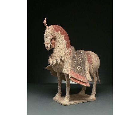 Ca. 386-534 AD. Northen Wei Dynasty. Terracotta Horse. An elegant hollow-moulded terracotta horse. This creme coloured horse 