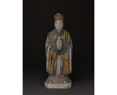 Ca. 1368-1644 AD. Chinese Ming Dynasty Attendant Figure. An elaborately crafted male attendant figure dressed in a grey robe 