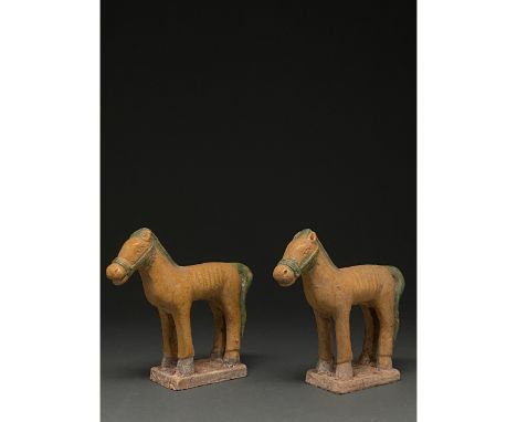 Ca. 1368-1644 AD. Chinese Ming Dynasty Ceramic Figures. Two beautifully crafted ochre-coloured glazed terracotta horses. The 