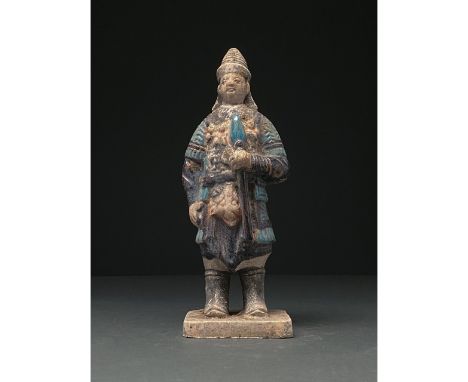 Ca. 1368-1644 AD. Chinese Ming Dynasty Warrior Figure. An elaborately crafted warrior attendant figure dressed in armour pick