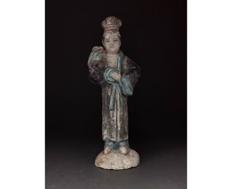 Ca. 1368-1644 AD. Ming Dynasty. Ceramic court lady. This female figure is presented wearing court attire, or shenyi, which co