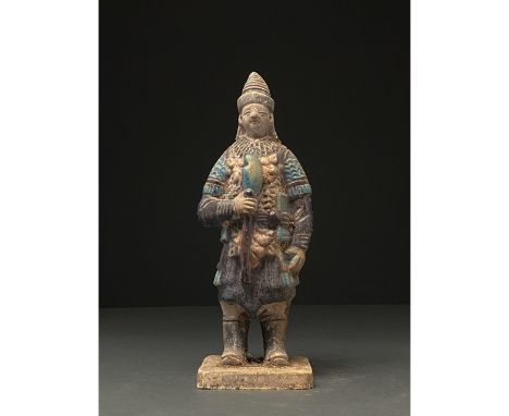 Ca. 1368-1644 AD. Chinese Ming Dynasty Warrior Figure. An elaborately crafted warrior attendant figure dressed in armour pick