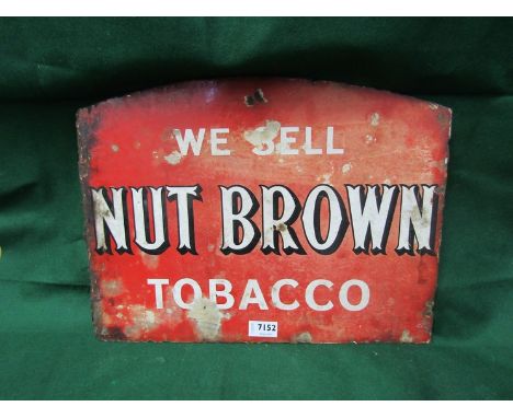An enamel sign: We Sell Nut Brown Tobacco, 18" x 13.5"    