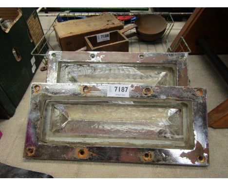 Two chrome cased industrial floor light covers 