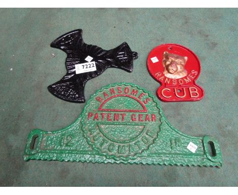 Two Ransomes cast iron plaques; Cub and 12" Ransomes Automaton and a cast iron 'The Meter Beater' kettle stand 
