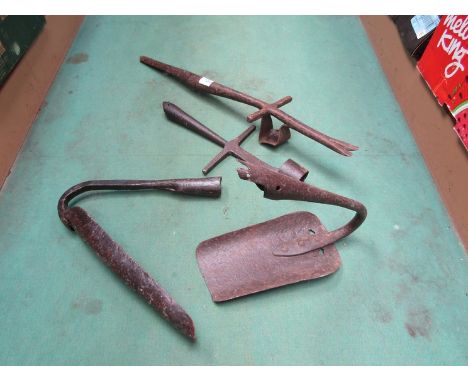 Two drainage scoop tool heads and two planting tool heads 