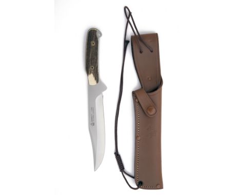 PUMA, SOLINGEN TWO SHEATH-KNIVES, including a boxed model 'WILDTOTER', serial no. 41582, with 5 3/4in. clip-point blade and n