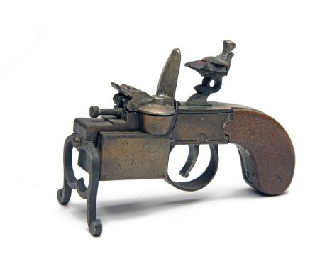 DUNHILL, LONDON A 'TINDER PISTOL' TABLE LIGHTER IN THE FORM OF A FLINTLOCK TINDERBOX, early version of A. Dunhill Ltd. and H.