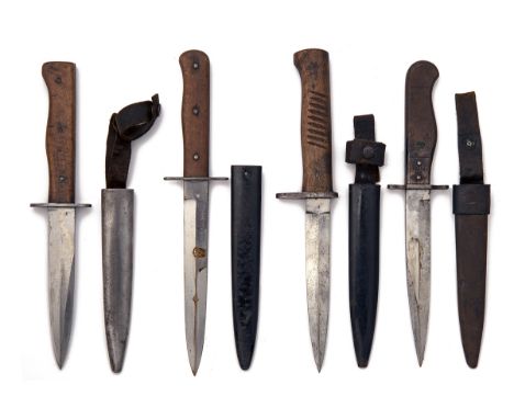 FOUR GERMAN WORLD WAR ONE AND TWO TRENCH-KNIVES, all different and including a World War one example with ribbed wood hilt an