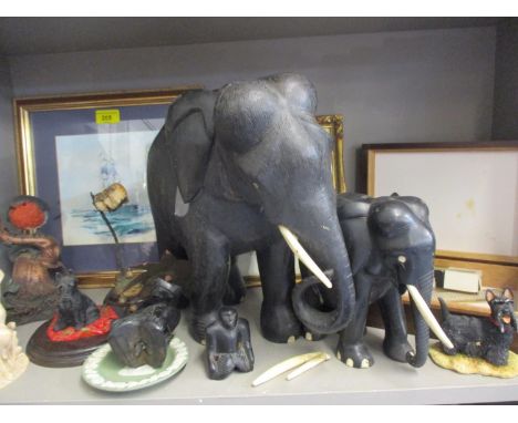 A mixed lot to include a large ebonized elephant, a signed watercolour of a sailing vessel, a 19th century pencil drawing and