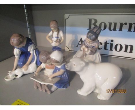 Royal Copenhagen and Bing and Grondahl figurines and a Lladro polar bear 