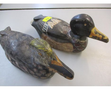 Two reproduction American sink boxes cast as decoy ducks having no rigging holes to the front, painted 