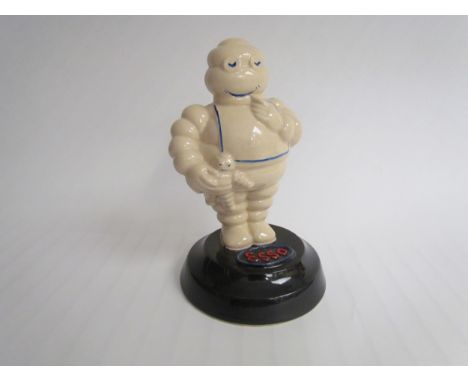 A ceramic Michelin Man style reproduction Esso figurine 