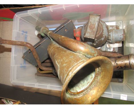 A box of tools etc. including a brass horn and a Daimler grease gun 