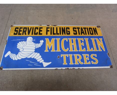 A reproduction Michelin Tires "Service Filling Station" enamel sign, 48cm x 23cm