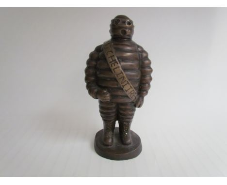 A hollow cast bronze Michelin Man "MITCELINITRES", 25cm tall 