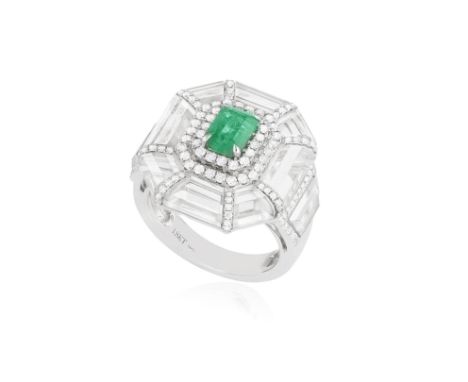 AN EMERALD, ROCK CRYSTAL AND DIAMOND RINGThe rectangular-cut emerald at the centre with a double frame of brilliant-cut diamo