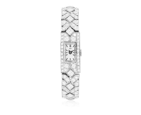 A LADY'S DIAMOND AND PLATINUM COCKTAIL WATCH, BY ILY, CIRCA 1930The 17-jewel manual wind movement, rectangular silvered dial,