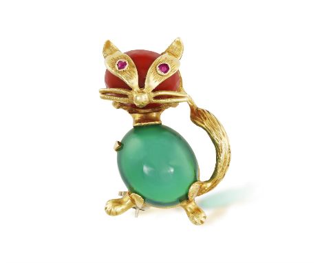 A GEM-SET NOVELTY BROOCH, CIRCA 1965Modelled as a cat with green chrysoprase cabochon body and red hardstone cabochon head, w