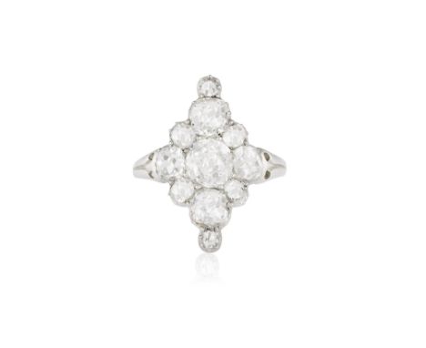 AN EARLY 20TH CENTURY DIAMOND CLUSTER RINGSet with old brilliant and cushion-shaped diamonds forming a navette-shaped cluster