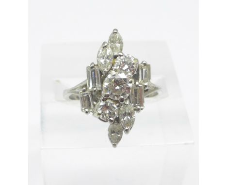 A white metal set diamond cluster ring, set with eleven diamonds, 5.6g, R