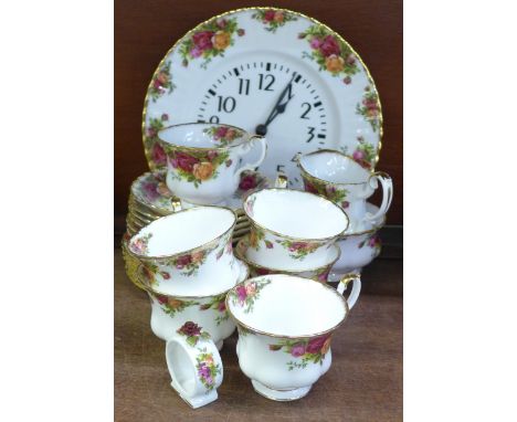 A collection of Royal Albert Old Country Roses china including six cups, saucers and side plates, one cream and one sugar