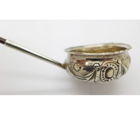 A ladle with whale bone handle, c.1800 with Elizabeth I coin insert