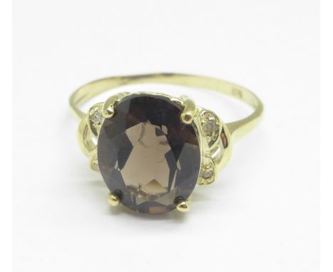 A 9ct gold, smoky quartz and diamond ring, 1.6g, O