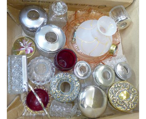 A collection of glassware including hair tidies, trinket boxes and a paperweight, etc.