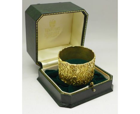 A silver gilt designer napkin ring, cased, Watling of Lacock, 47g