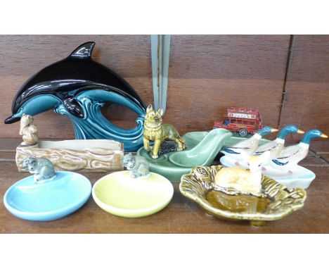 China including a Poole pottery dolphin, Wade, Sylvac and Beswick